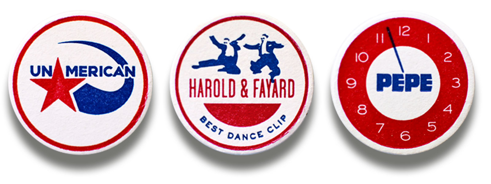 Three magnets: “Unamerican”, “Harold & Fayard, Best Dance Clip”, and “Pepe”, featuring the face of a clock.