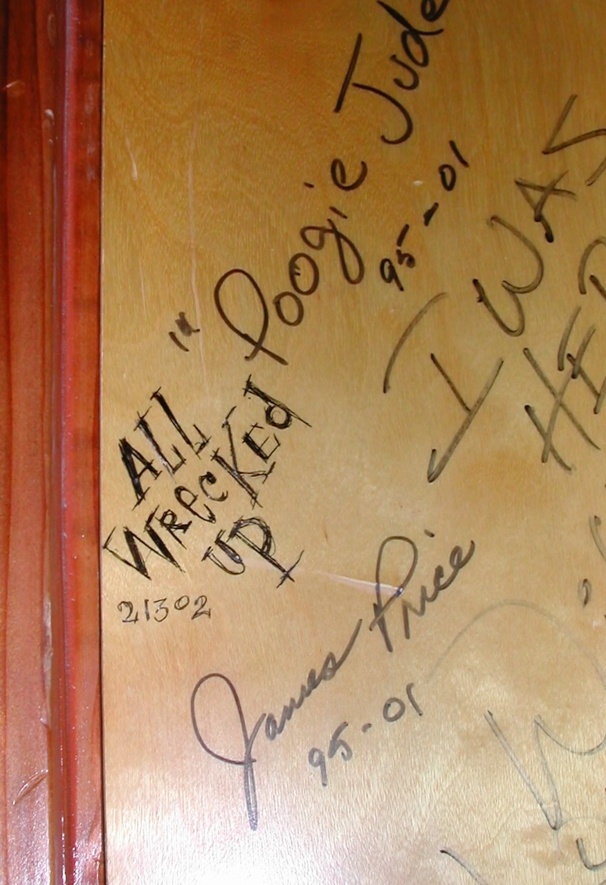 All Wrecked Up’s band name written in pen on the wall, backstage at the Freight & Salvage in Berkeley, February 2002